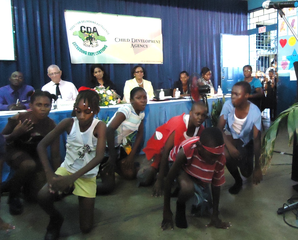 Children from the Allman Town Primary School’s drama group, Drama Ink, perform the piece Child Labour as officials look on. The Occasion was the Child Development Agency’s every Child is My Child Community Forum and Expo held at the school recently. The event was held recently under the theme, “Parenting for Positive Change in Jamaica”. 